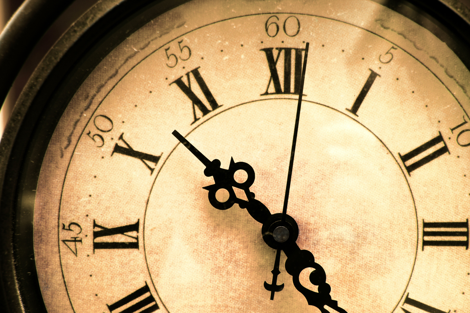 Antique clock face with Roman numerals